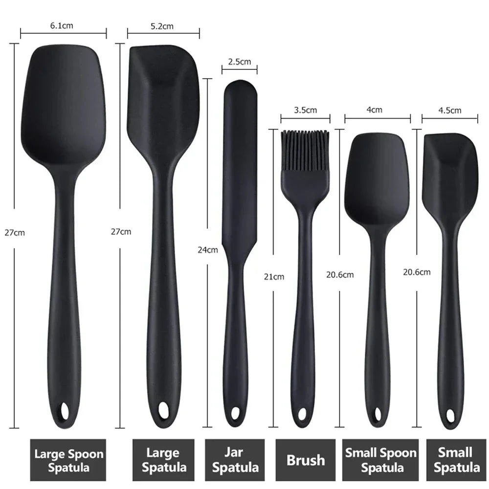Black silicone kitchen utensil set with spatulas, spoon spatulas, jar spatula, and brush, labeled with sizes