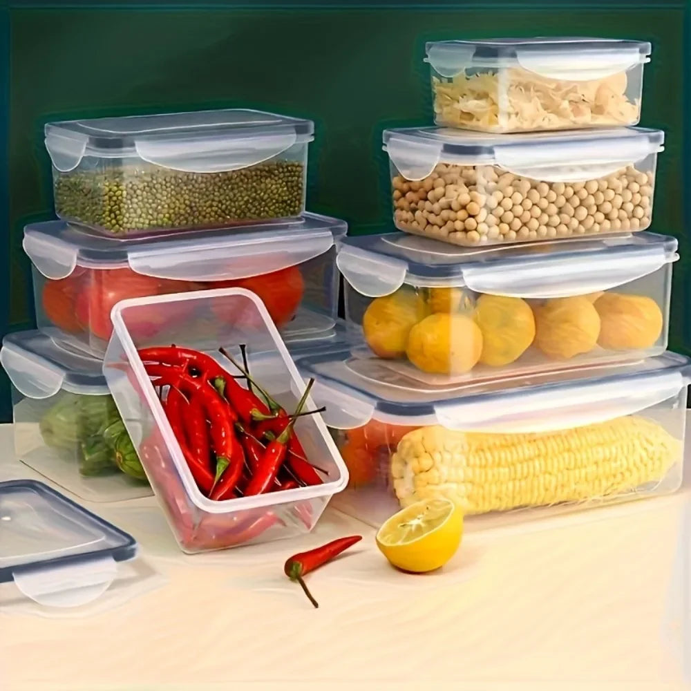 Clear plastic food storage containers with lids, holding fresh veggies, corn, beans, and peppers for kitchen organization.